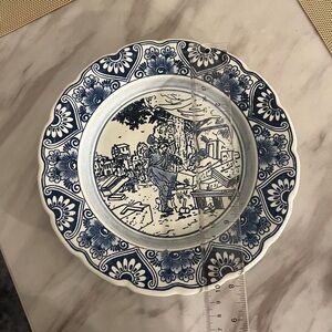 Unique Royal Delfts Wall Plate Blue and White Depicts Coffin Maker
